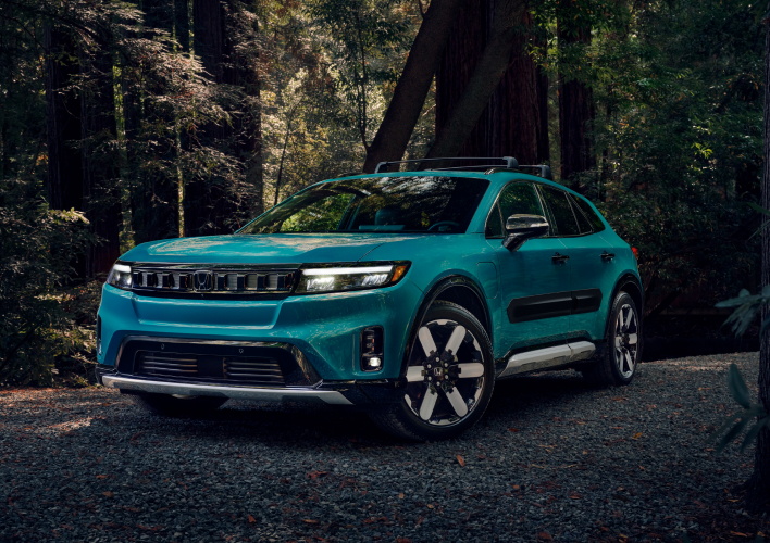 Honda Prologue parked by a beautiful lake